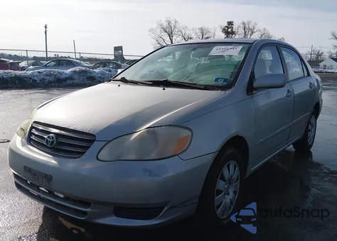 2004 Toyota Corolla Le z USA, uszkodzony, nr VIN 2T1BR32E04C205841